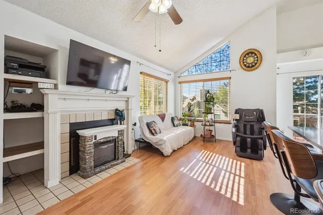 a living room with furniture or couch and a large window