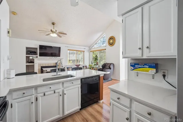 a bedroom with bed and wooden floor