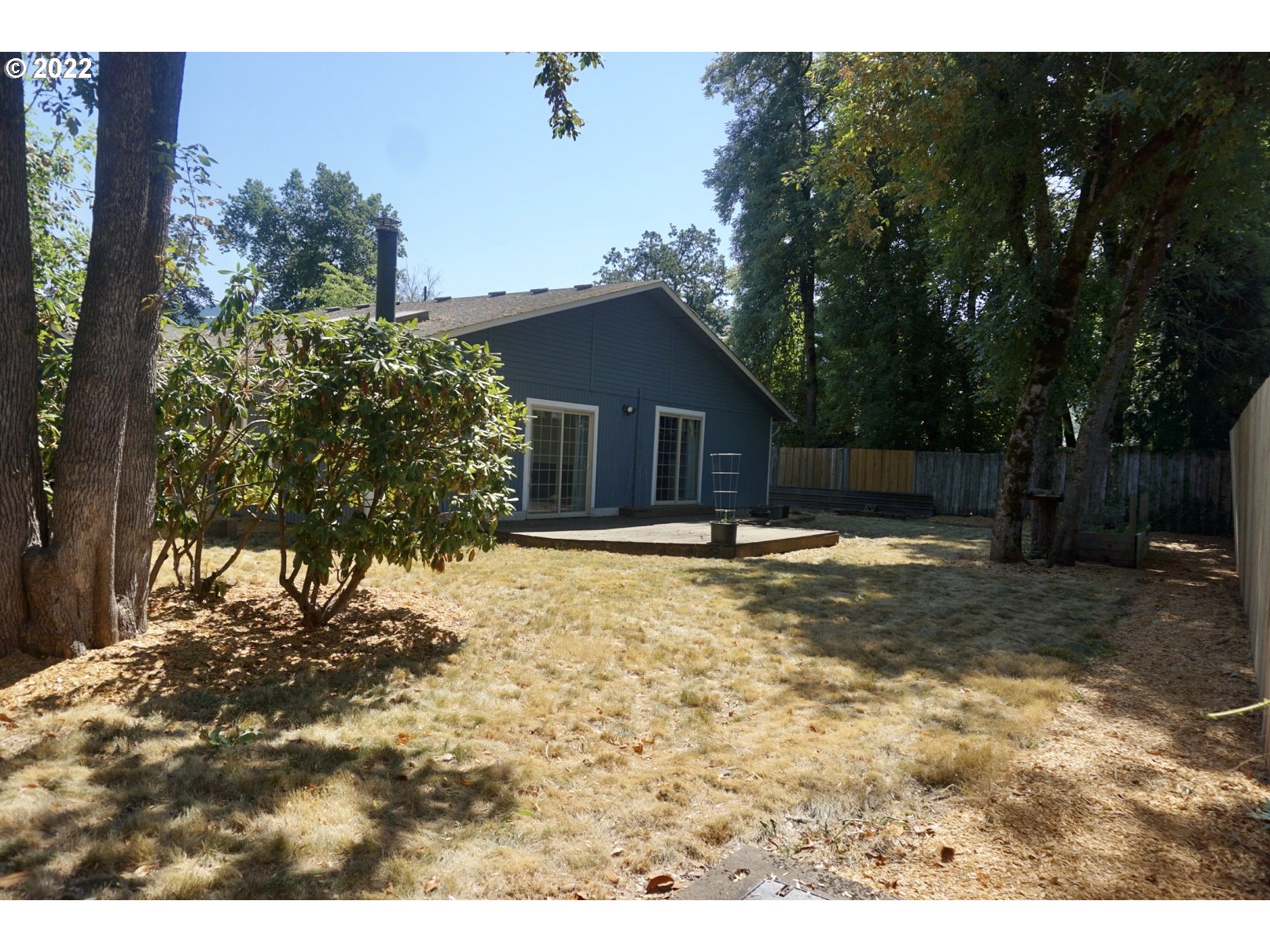384 69th Place Springfield, OR 97478 - Photo 15 of 20 a view of a house with a yard