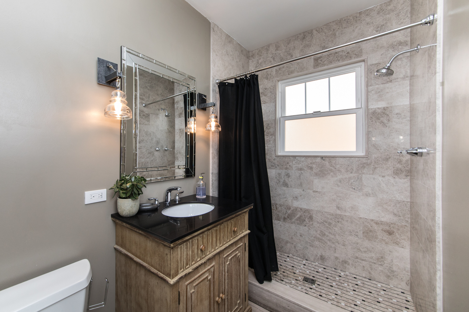 100 Wisner Street Park Ridge, IL 60068 - Photo 14 of 36 a bathroom with a granite countertop sink a mirror and a shower