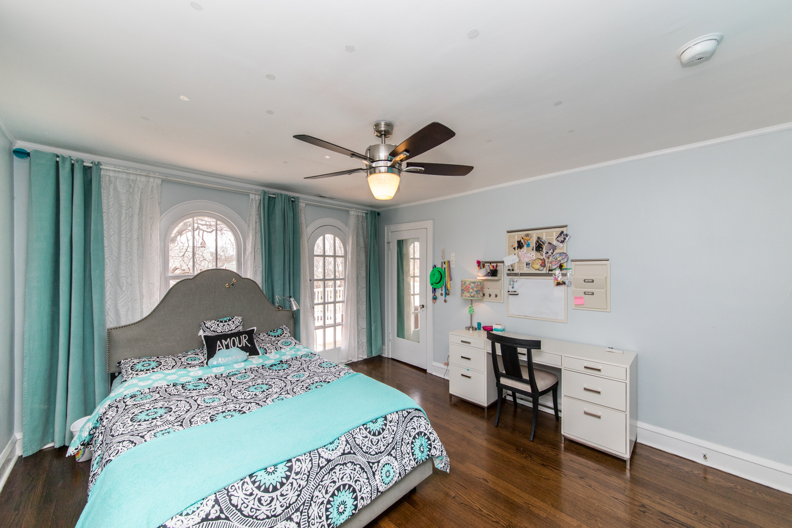 100 Wisner Street Park Ridge, IL 60068 - Photo 22 of 36 a bedroom with a bed and a chandelier