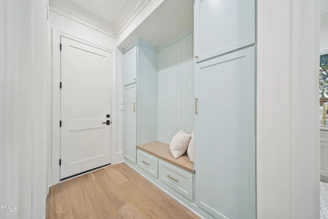 a bedroom with a bed and a shower