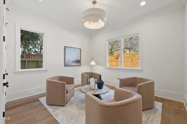 a living room with furniture and window