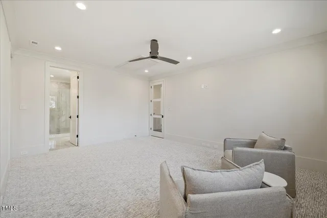 a view of a house with swimming pool and sitting area