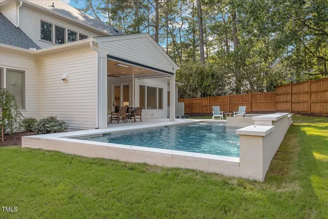 a view of a backyard with green space