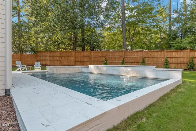 a outdoor living space with furniture and garden view