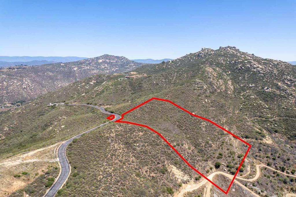 18055 Sunset Point Poway, CA 92064 - Photo 6 of 39 a view of a small house in a field