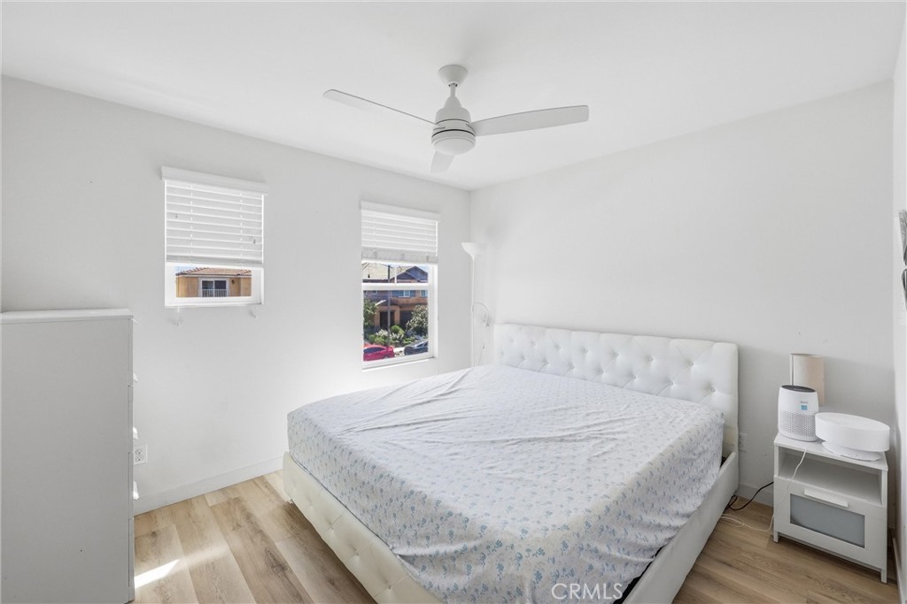4783 Vanderham Way Eastvale, CA 91752 - Photo 17 of 29 a bedroom with a bed and a window
