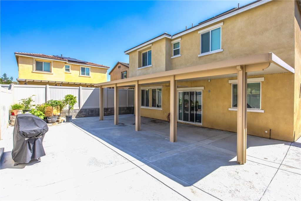 4783 Vanderham Way Eastvale, CA 91752 - Photo 26 of 29 a view of a house with chair in front of house