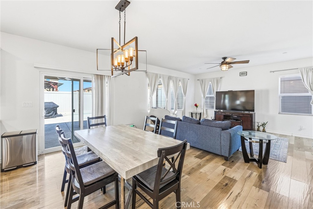 4783 Vanderham Way Eastvale, CA 91752 - Photo 10 of 29 a view of a dining room with furniture