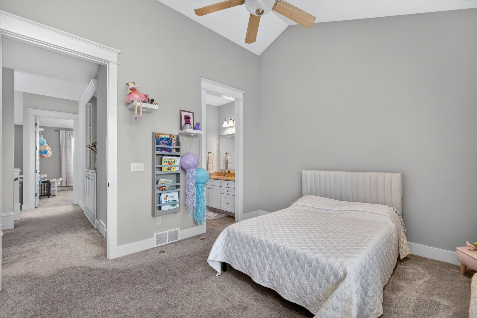 5700 Emily Road Bettendorf, IA 52722 - Photo 28 of 58 a bedroom with a bed and a walk in closet