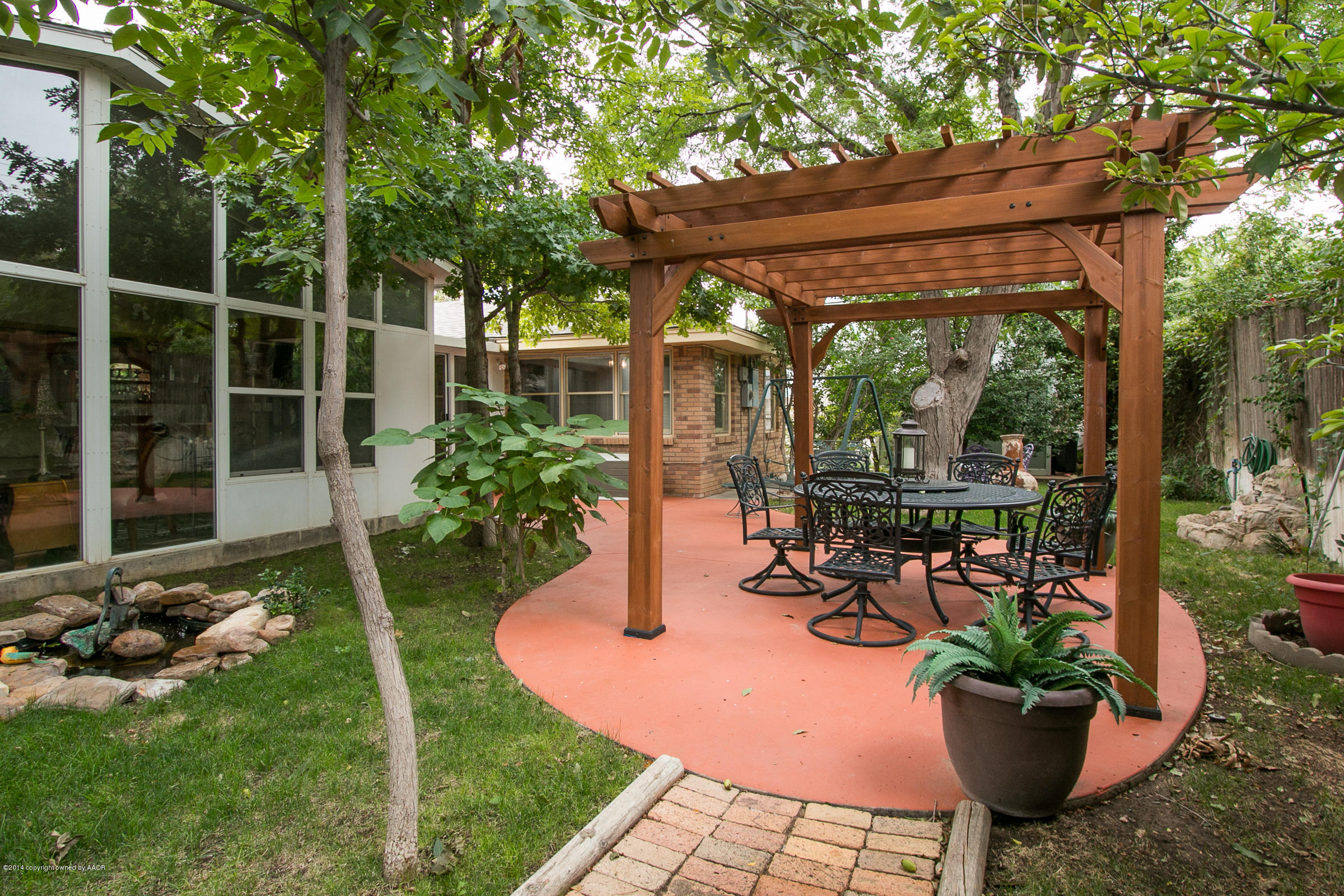 5306 Randolph Road Amarillo, TX 79106 - Photo 16 of 28 019_Patio and Sunroom