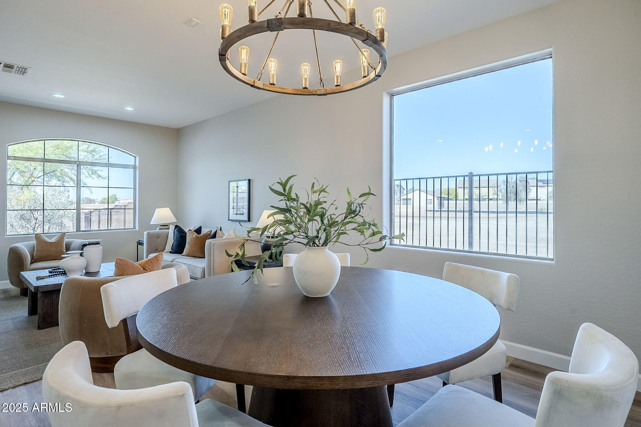 5503 West Carson Road Laveen, AZ 85339 - Photo 6 of 56 a dining room with furniture a window and a table
