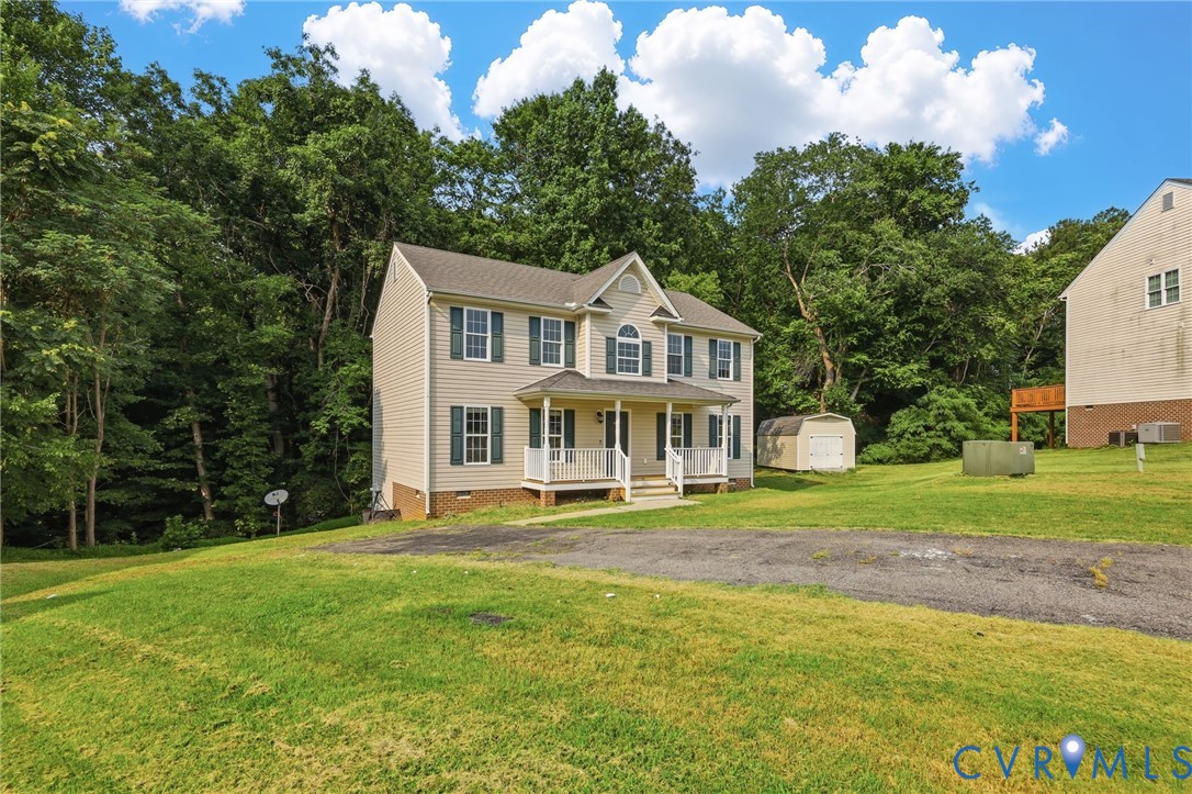 7610 Sugar Run Road Hopewell, VA 23860 - Photo 5 of 48 Two-story residential structure with a covered fro