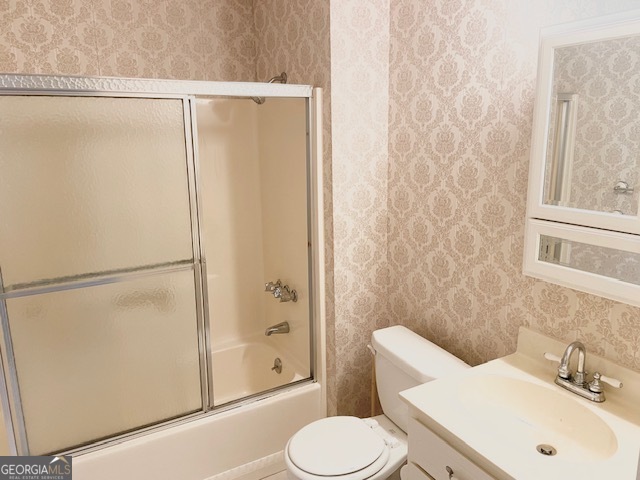 528 Ansley Avenue Perry, GA 31069 - Photo 6 of 9 a bathroom with a sink toilet and shower