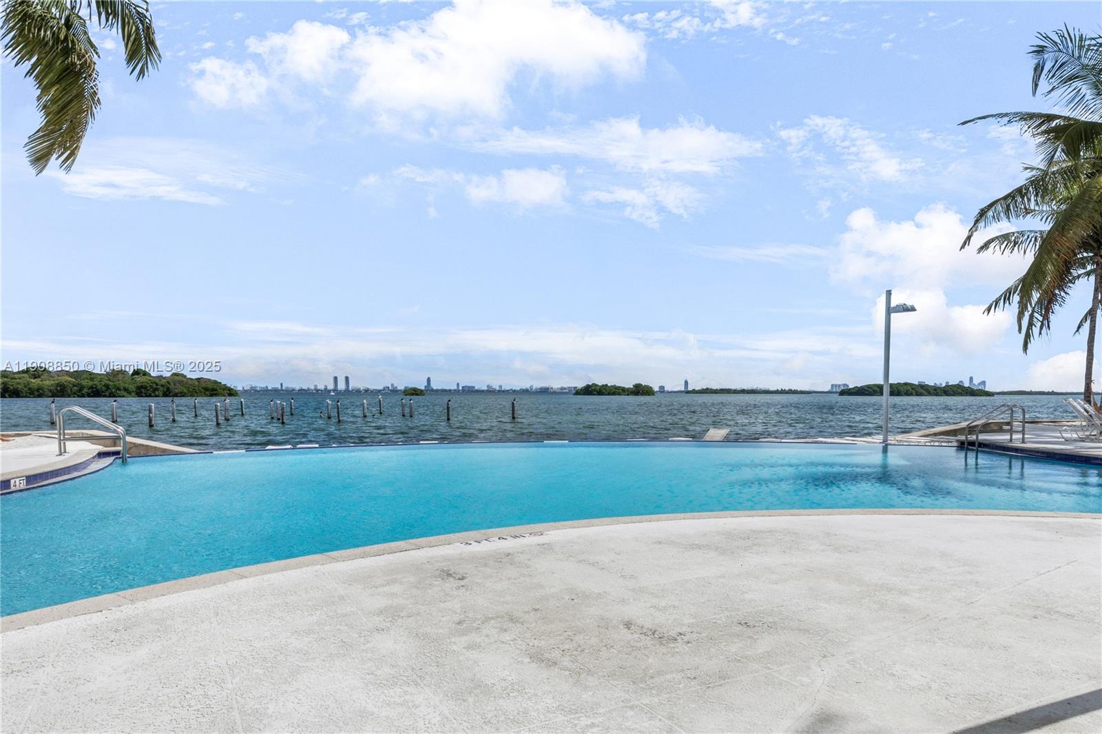 650 Northeast 64th Street, Unit G208 Miami, FL 33138 - Photo 7 of 8 a view of a lake with a big yard