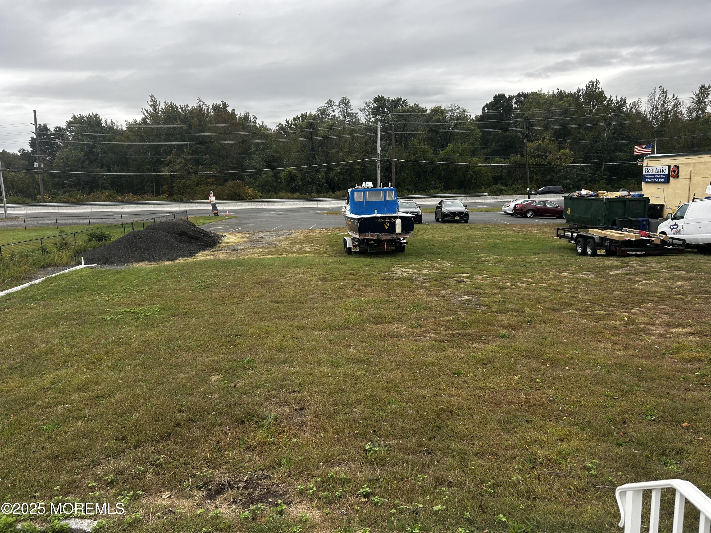 36 State Rte Port Port Monmouth, NJ 07758 - Photo 7 of 7 a view of a lake with a car parked