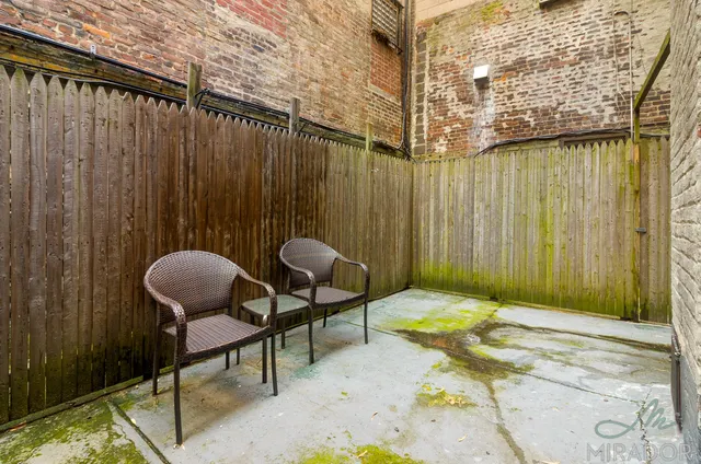a bathroom with a toilet a sink and a bathtub