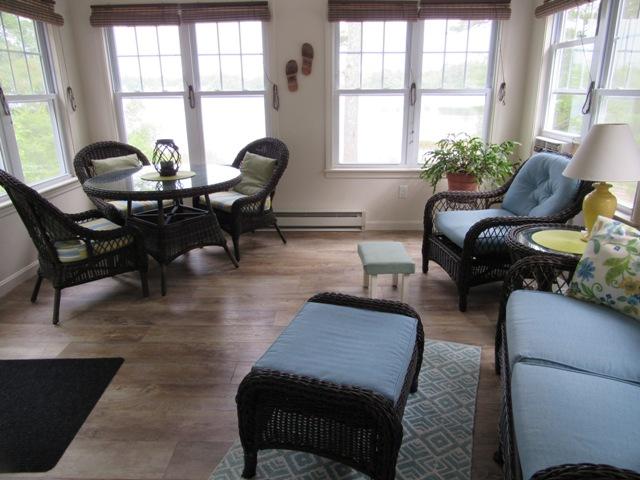 24 Spectacle Pond Road East Wareham, MA 02538 - Photo 12 of 32 a living room with furniture and two large window
