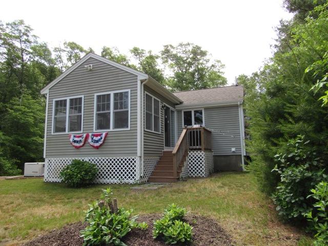 24 Spectacle Pond Road East Wareham, MA 02538 - Photo 2 of 32 a view of a house with a garage