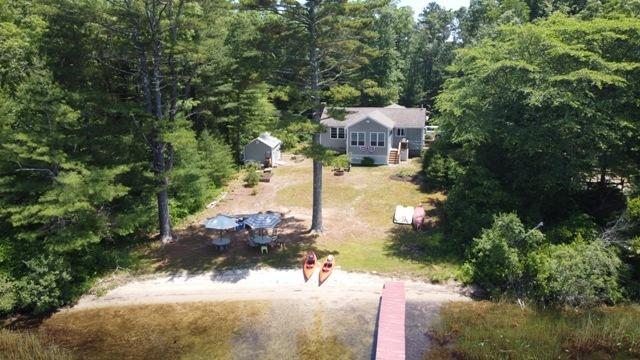 24 Spectacle Pond Road East Wareham, MA 02538 - Photo 29 of 32 a view of a house with a yard