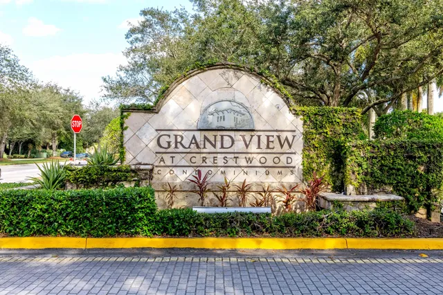 a view of swimming pool with a garden and swimming pool