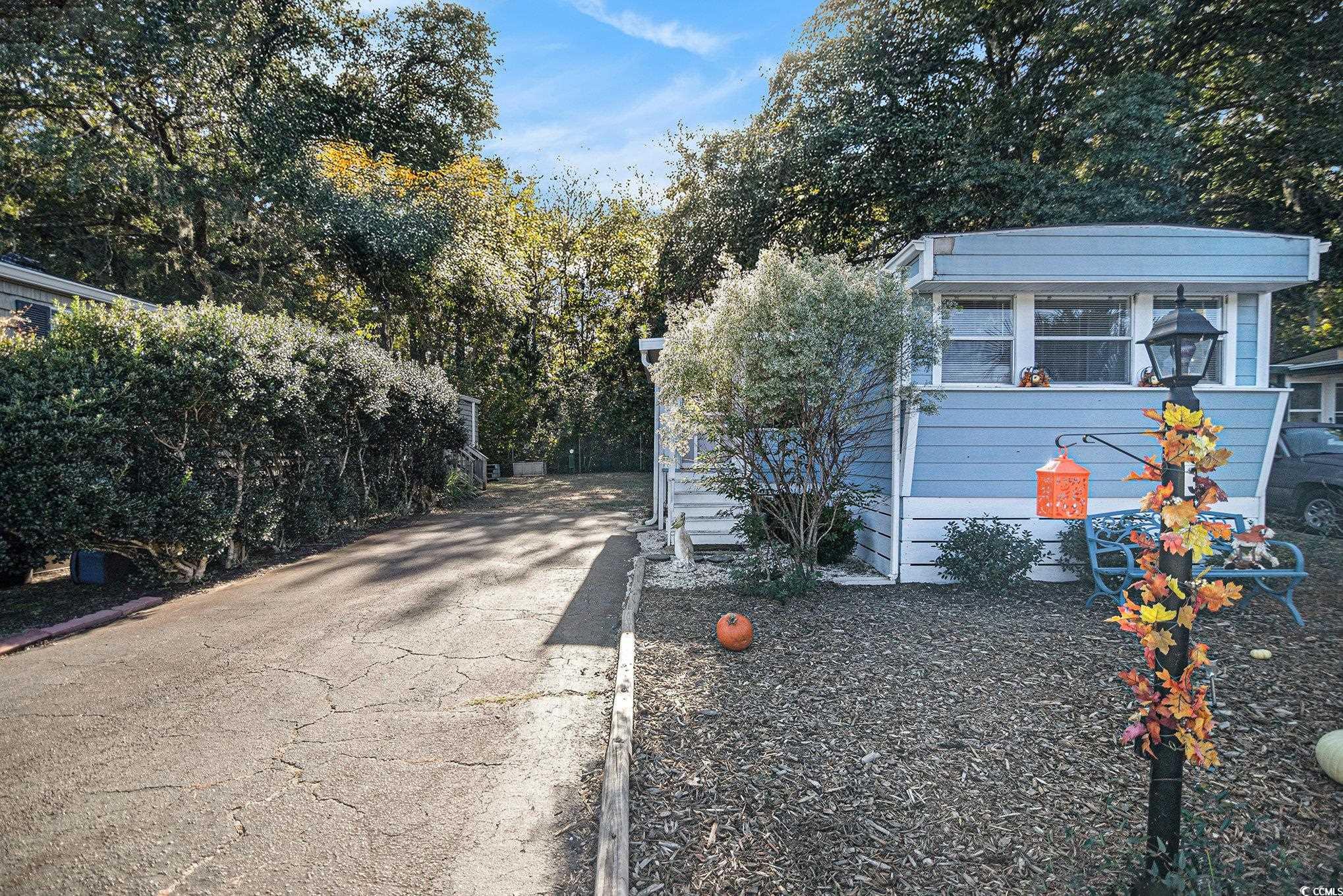 63 Saxon Court Murrells Inlet, SC 29576 - Photo 16 of 22 View of yard with a shed