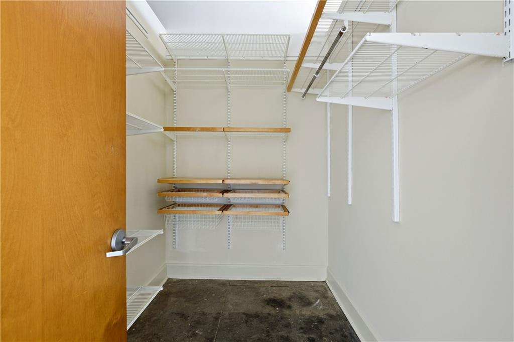 505 Whitehall Street Southwest, Unit 307 Atlanta, GA 30303 - Photo 16 of 35 a view of storage and utility room with racks on the wall