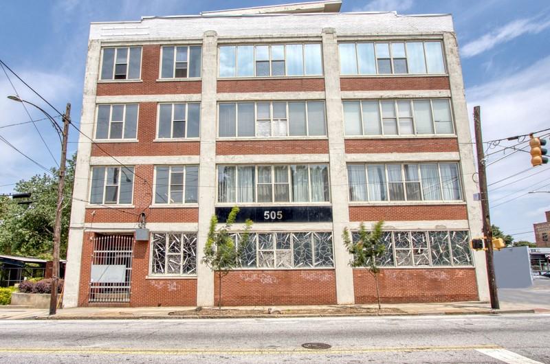 505 Whitehall Street Southwest, Unit 307 Atlanta, GA 30303 - Photo 24 of 37 a view of a brick building next to a road