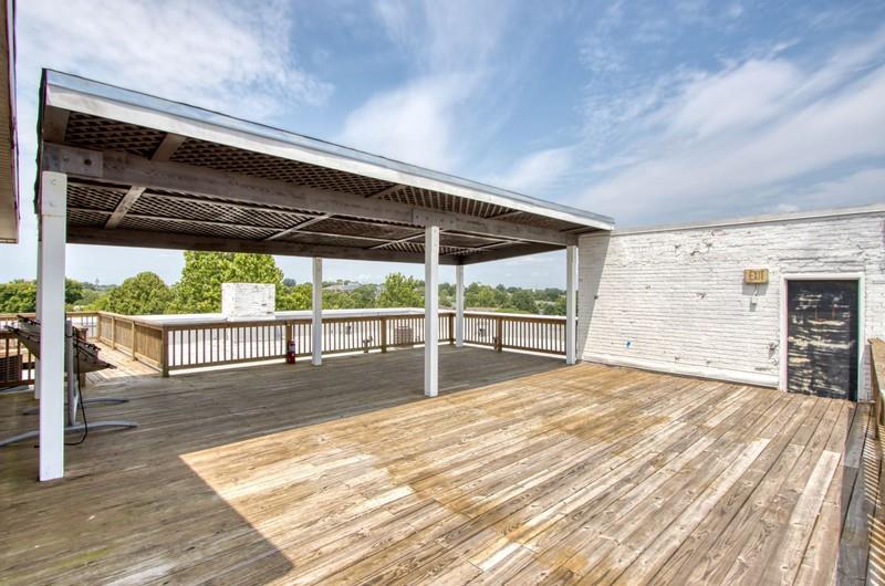 505 Whitehall Street Southwest, Unit 307 Atlanta, GA 30303 - Photo 32 of 37 a view of backyard with wooden floor and roof