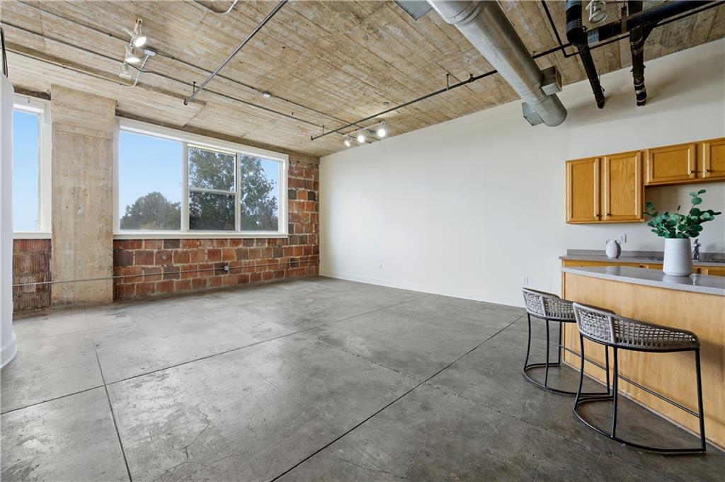 505 Whitehall Street Southwest, Unit 307 Atlanta, GA 30303 - Photo 6 of 37 a view of furniture and window in a room