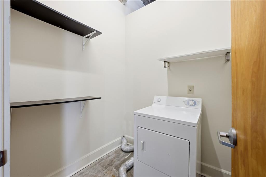 505 Whitehall Street Southwest, Unit 307 Atlanta, GA 30303 - Photo 10 of 37 a utility room with dryer and washer