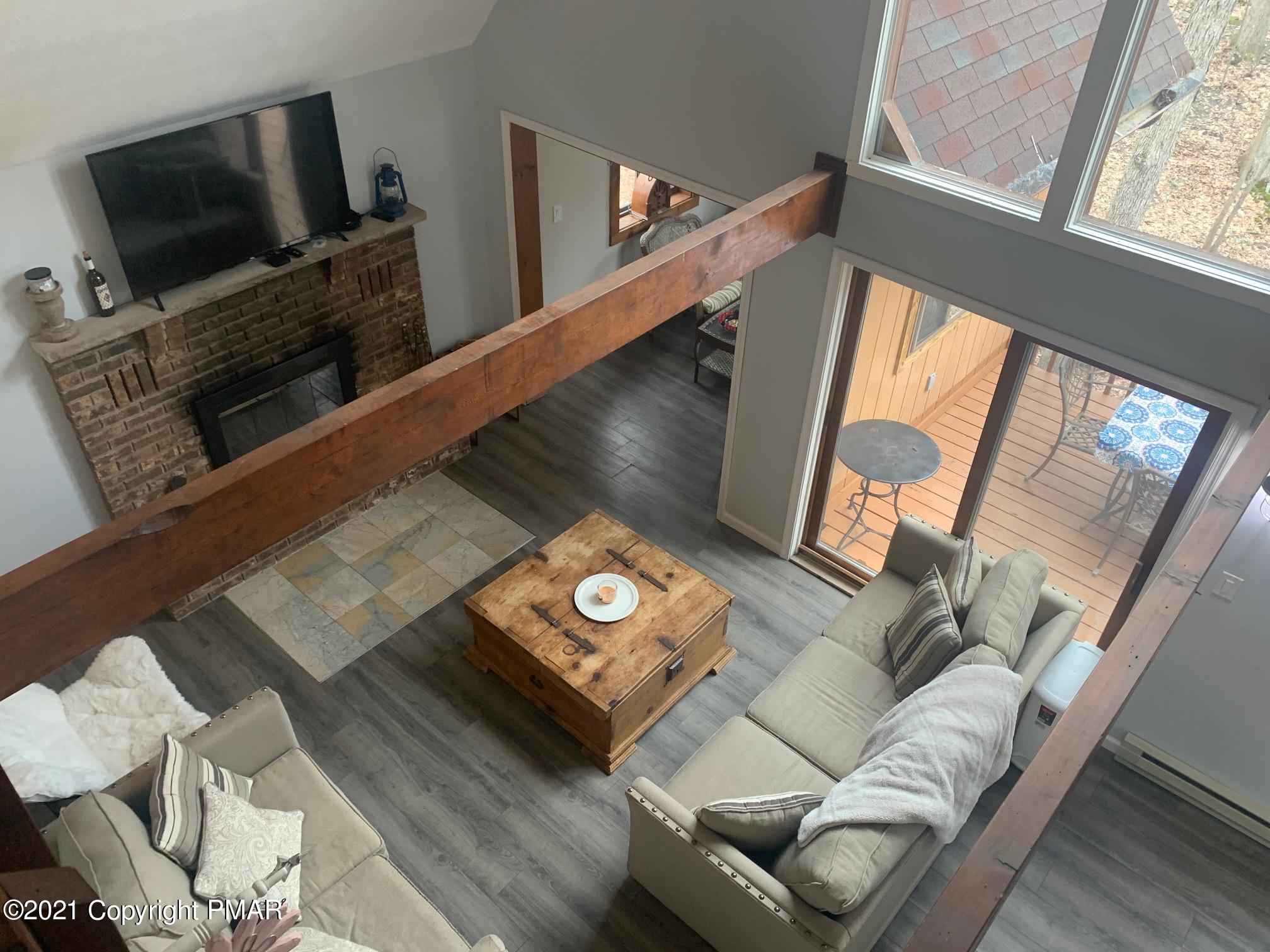 1090 Hampstead Road Bushkill, PA 18324 - Photo 11 of 24 a living room with furniture and a flat screen tv