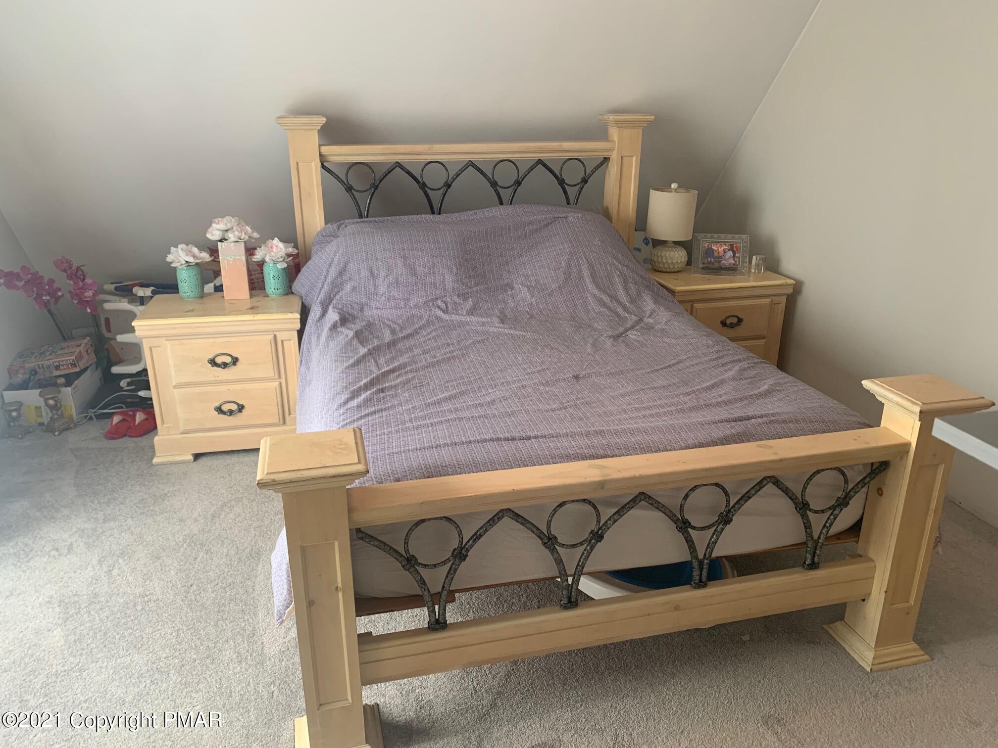 1090 Hampstead Road Bushkill, PA 18324 - Photo 17 of 24 a bedroom with a bed and a dresser