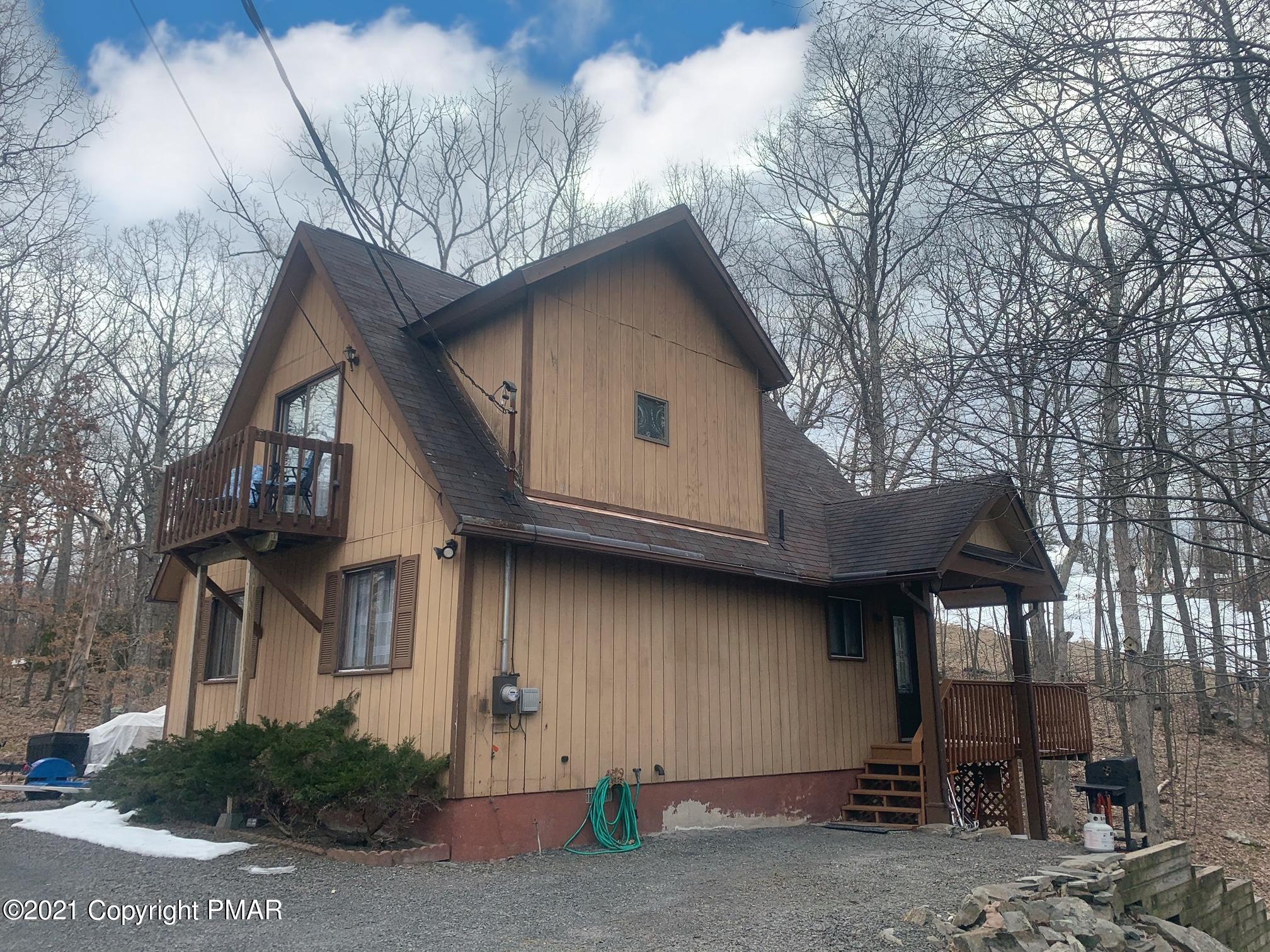 1090 Hampstead Road Bushkill, PA 18324 - Photo 2 of 24 a house view with a outdoor space