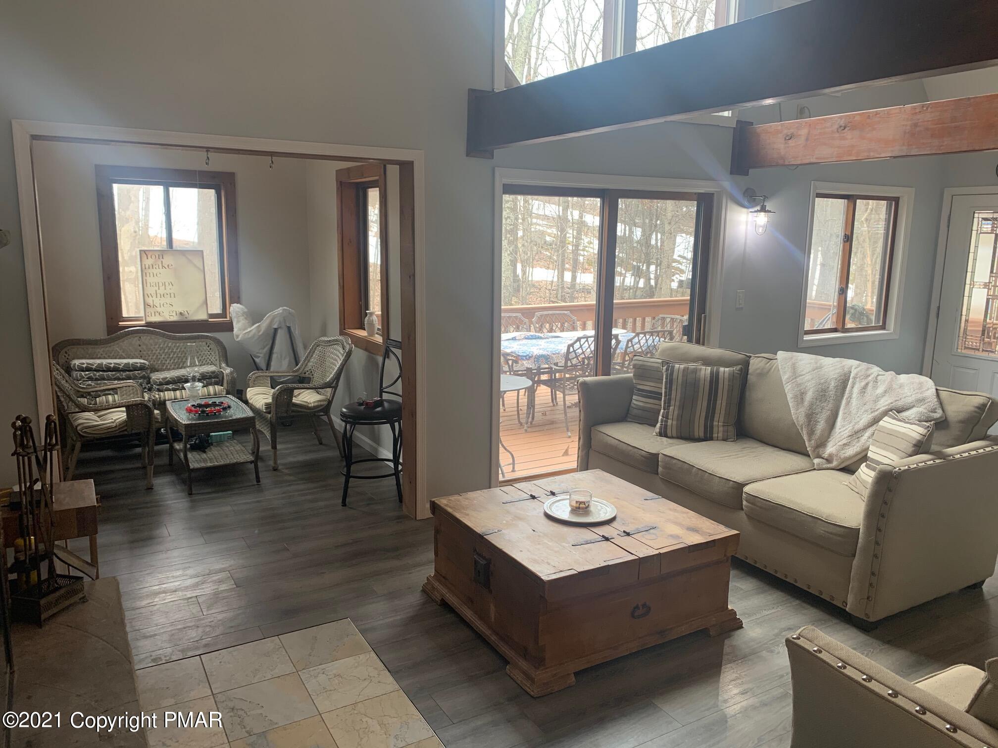 1090 Hampstead Road Bushkill, PA 18324 - Photo 9 of 24 a living room with furniture and a large window
