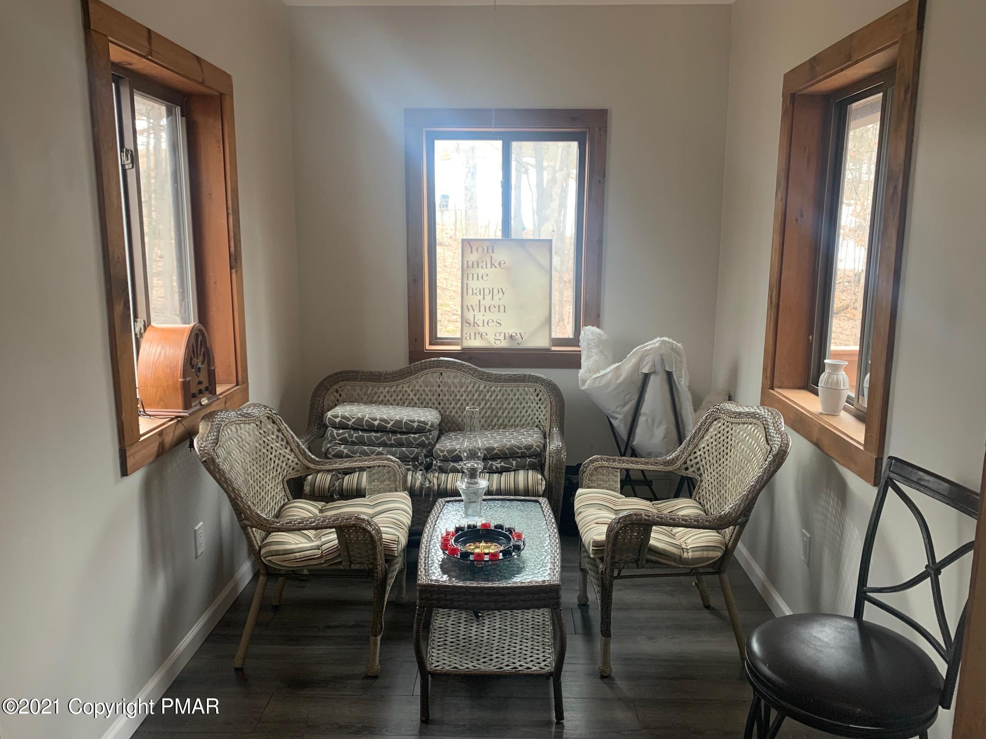 1090 Hampstead Road Bushkill, PA 18324 - Photo 10 of 24 a living room with furniture and a window