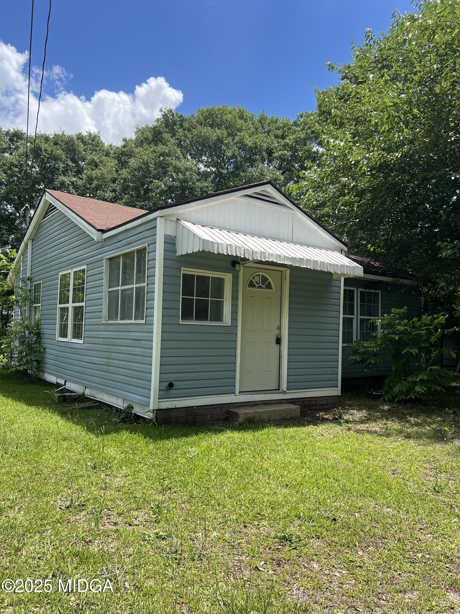 101 Jacobs Lane Warner Robins, GA 31093 - Photo 2 of 18 a view of a house with a yard plants and large tree