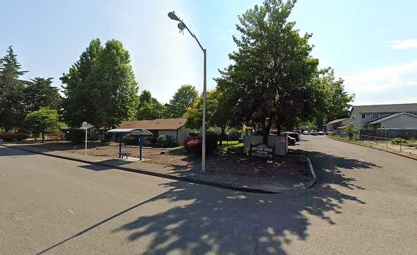 a view of a street with houses