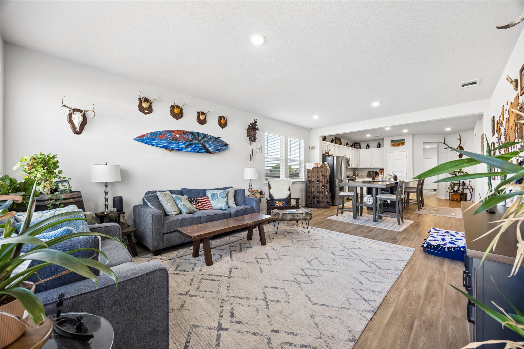 8300 Augeron Drive Austin, TX 78747 - Photo 5 of 16 Living room with light wood finished floors and recessed lighting