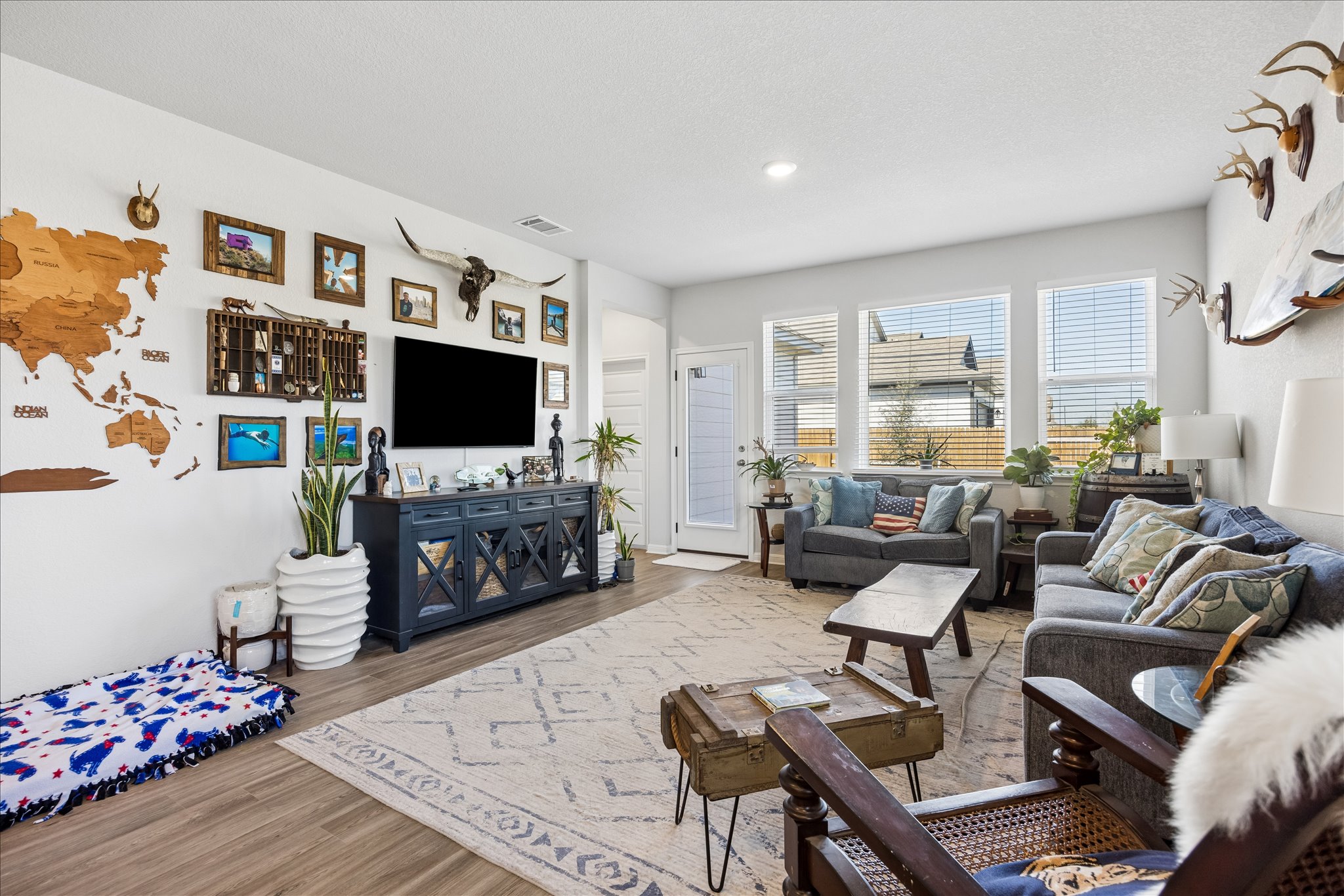8300 Augeron Drive Austin, TX 78747 - Photo 6 of 16 Living room featuring light wood-type flooring