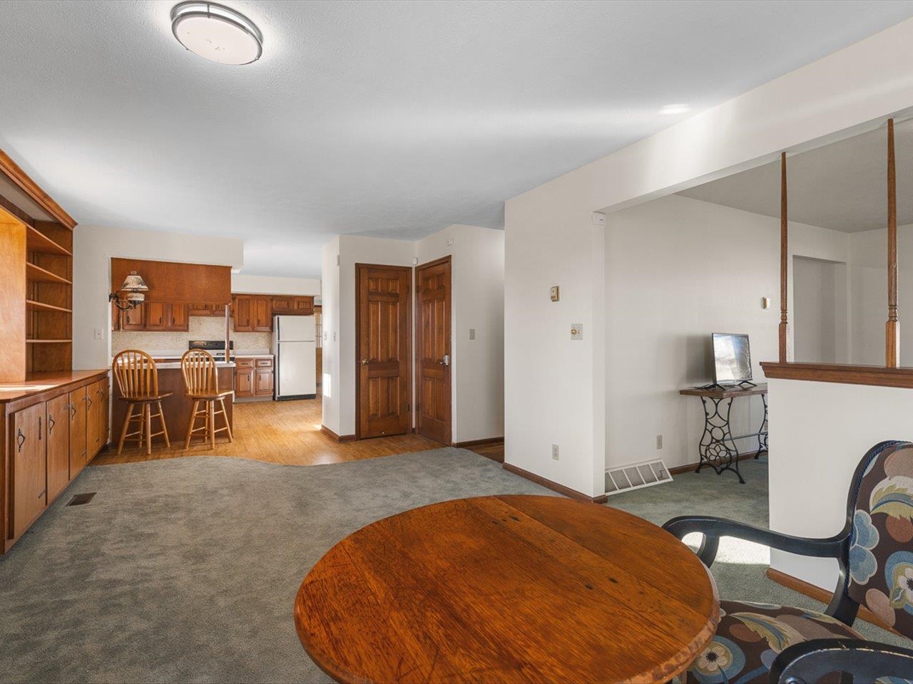 7101 Lawrenceville Road Garden Prairie, IL 61038 - Photo 11 of 53 a view of a livingroom with furniture and a dining table chair