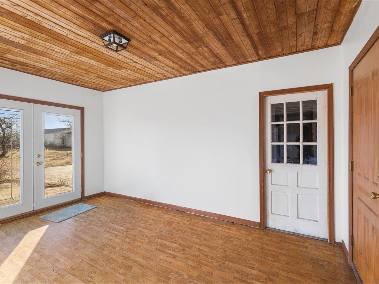 7101 Lawrenceville Road Garden Prairie, IL 61038 - Photo 23 of 53 a view of an empty room with a window