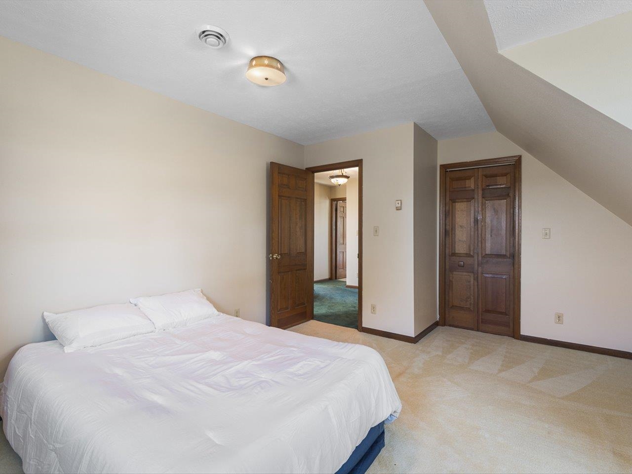 7101 Lawrenceville Road Garden Prairie, IL 61038 - Photo 36 of 53 a bedroom with a bed and closet