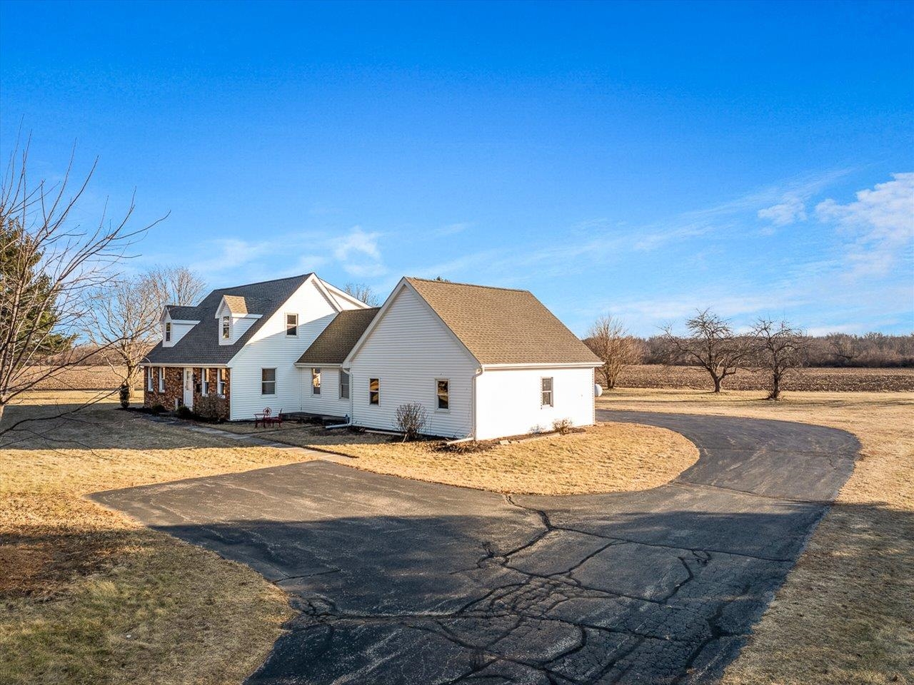 7101 Lawrenceville Road Garden Prairie, IL 61038 - Photo 43 of 53 a front view of a house with yard