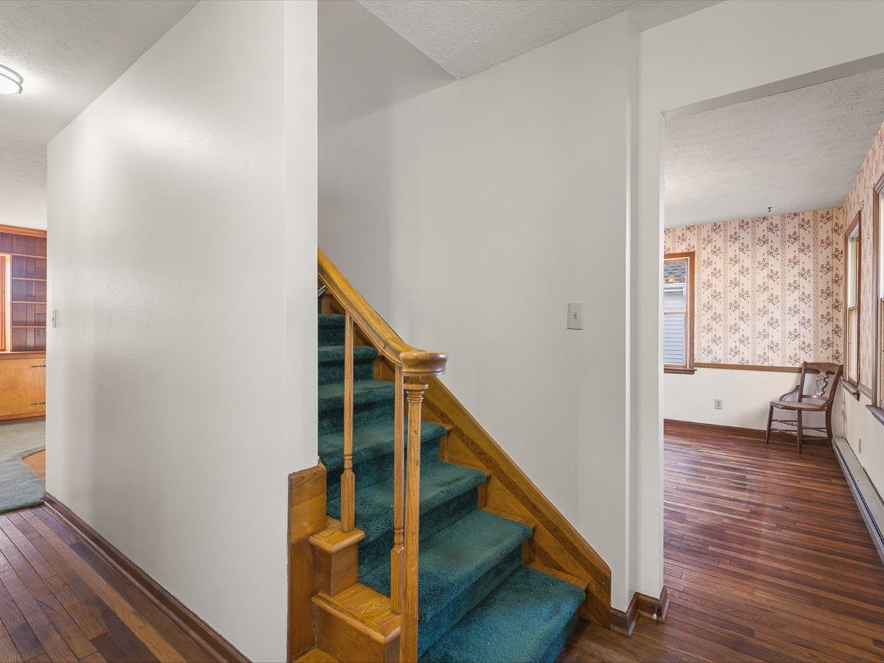 7101 Lawrenceville Road Garden Prairie, IL 61038 - Photo 5 of 53 a view of entryway with wooden floor and stairs