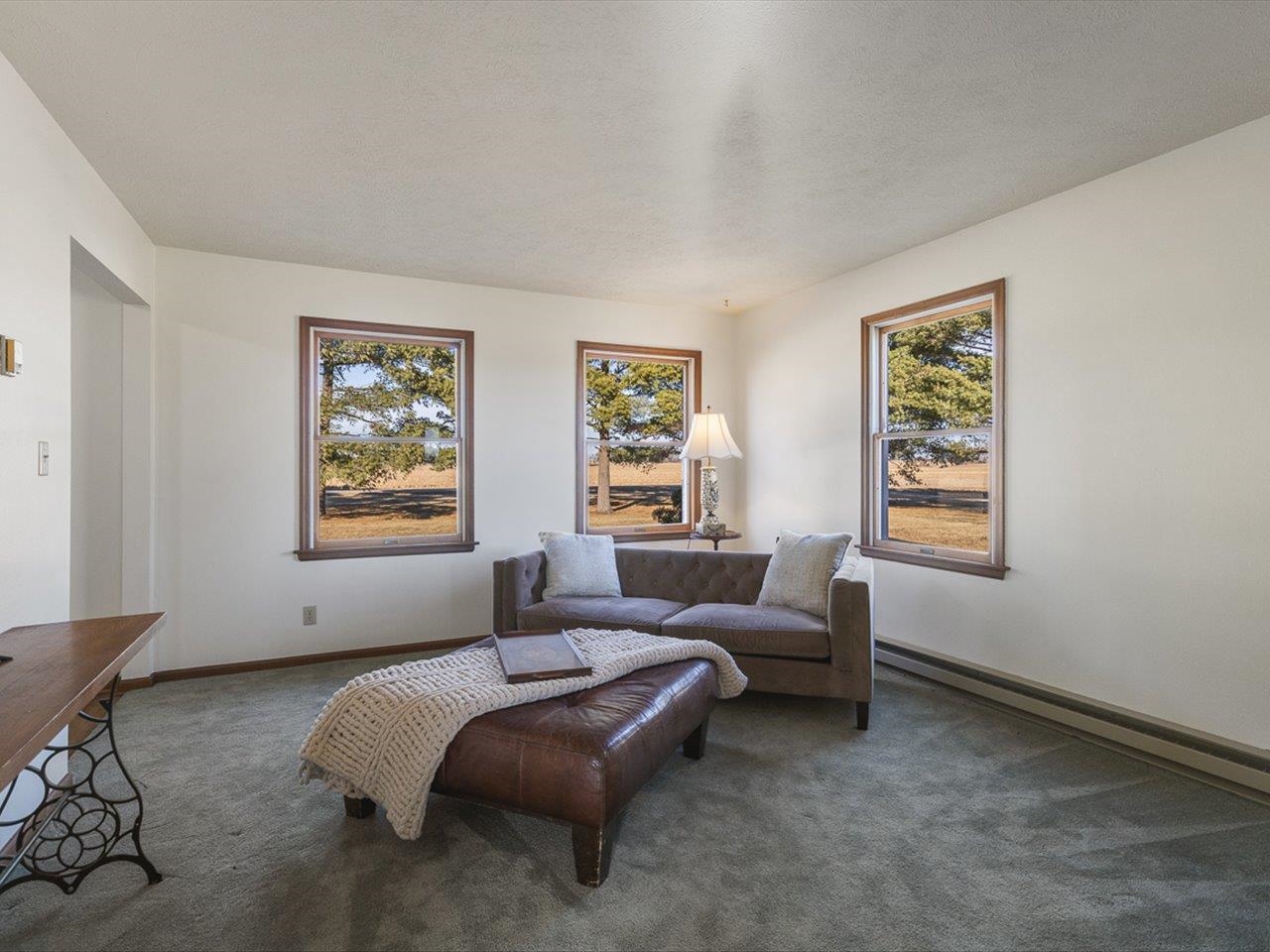 7101 Lawrenceville Road Garden Prairie, IL 61038 - Photo 9 of 53 a living room with furniture and a window