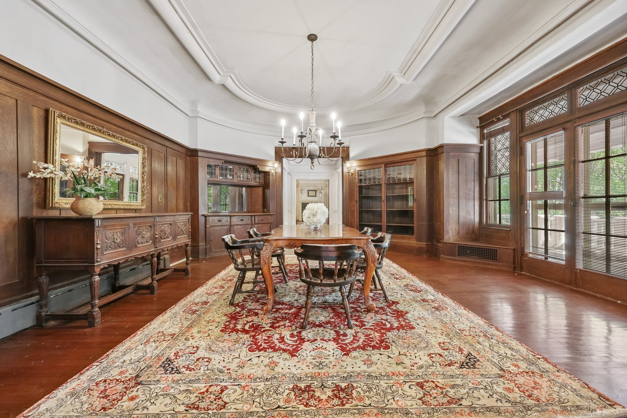 26 Shady Lane Greenwich, CT 06831 - Photo 15 of 29 a view of a dining room with furniture window and wooden floor
