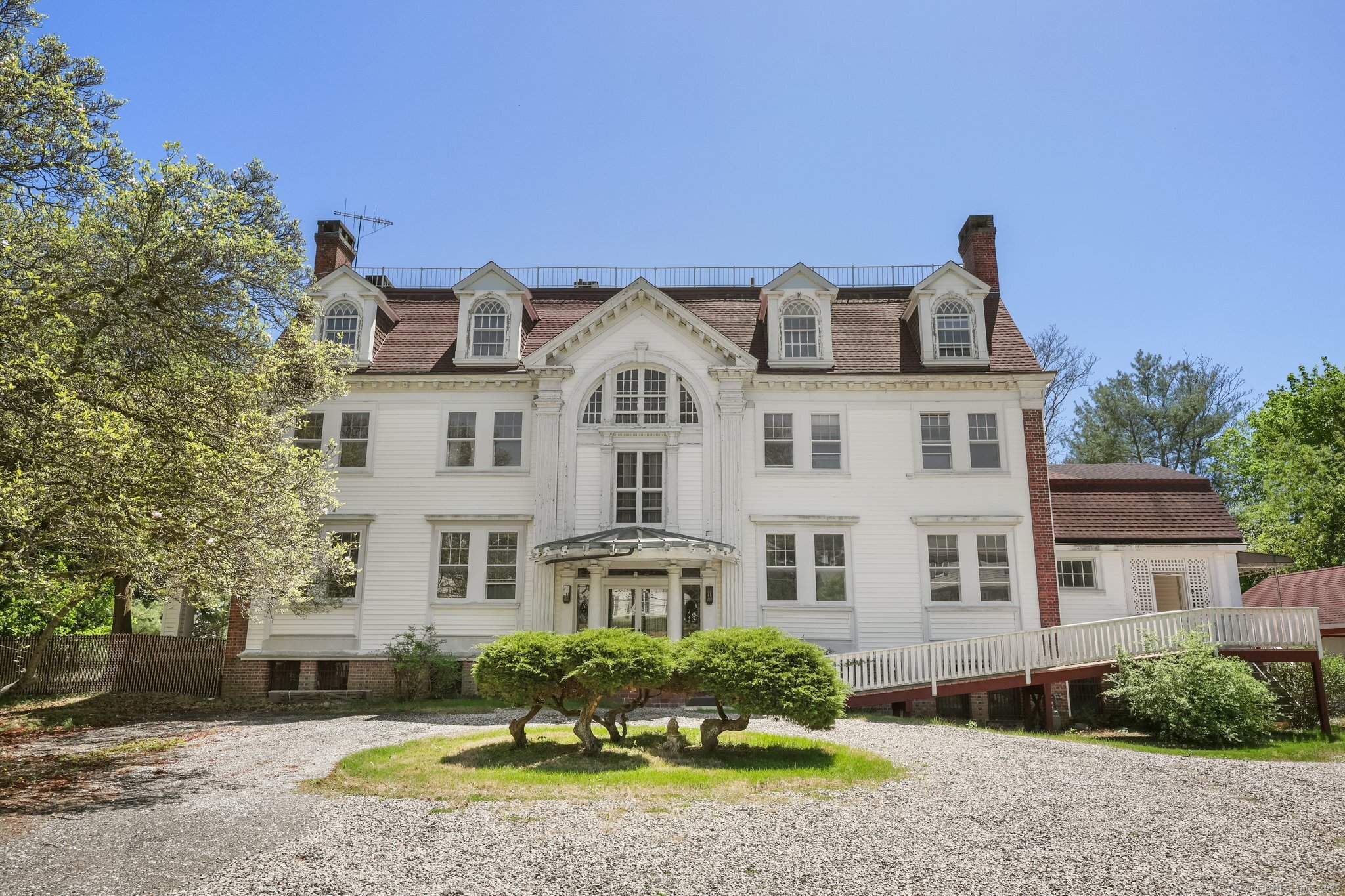 26 Shady Lane Greenwich, CT 06831 - Photo 2 of 29 front view of a house with a yard