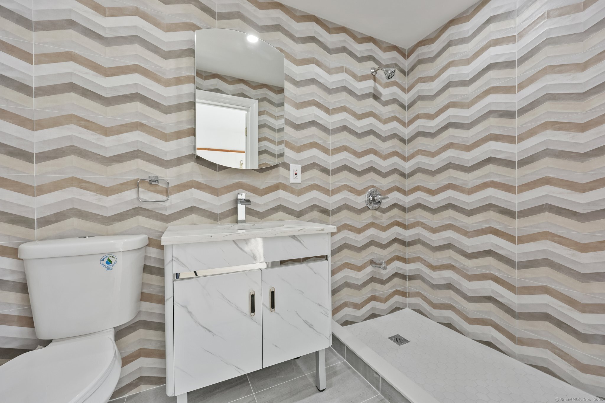 26 Shady Lane Greenwich, CT 06831 - Photo 24 of 29 a bathroom with a bathtub and shower